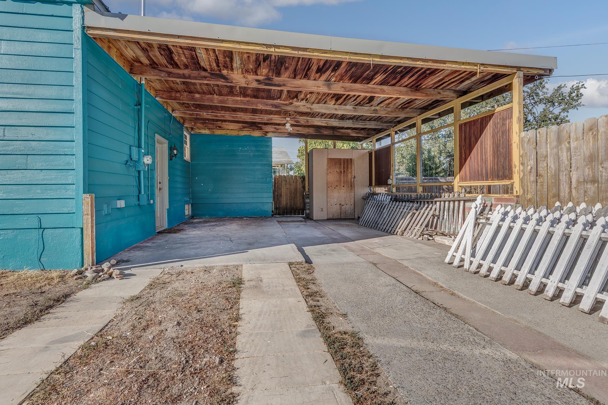 View of patio with an outbuilding