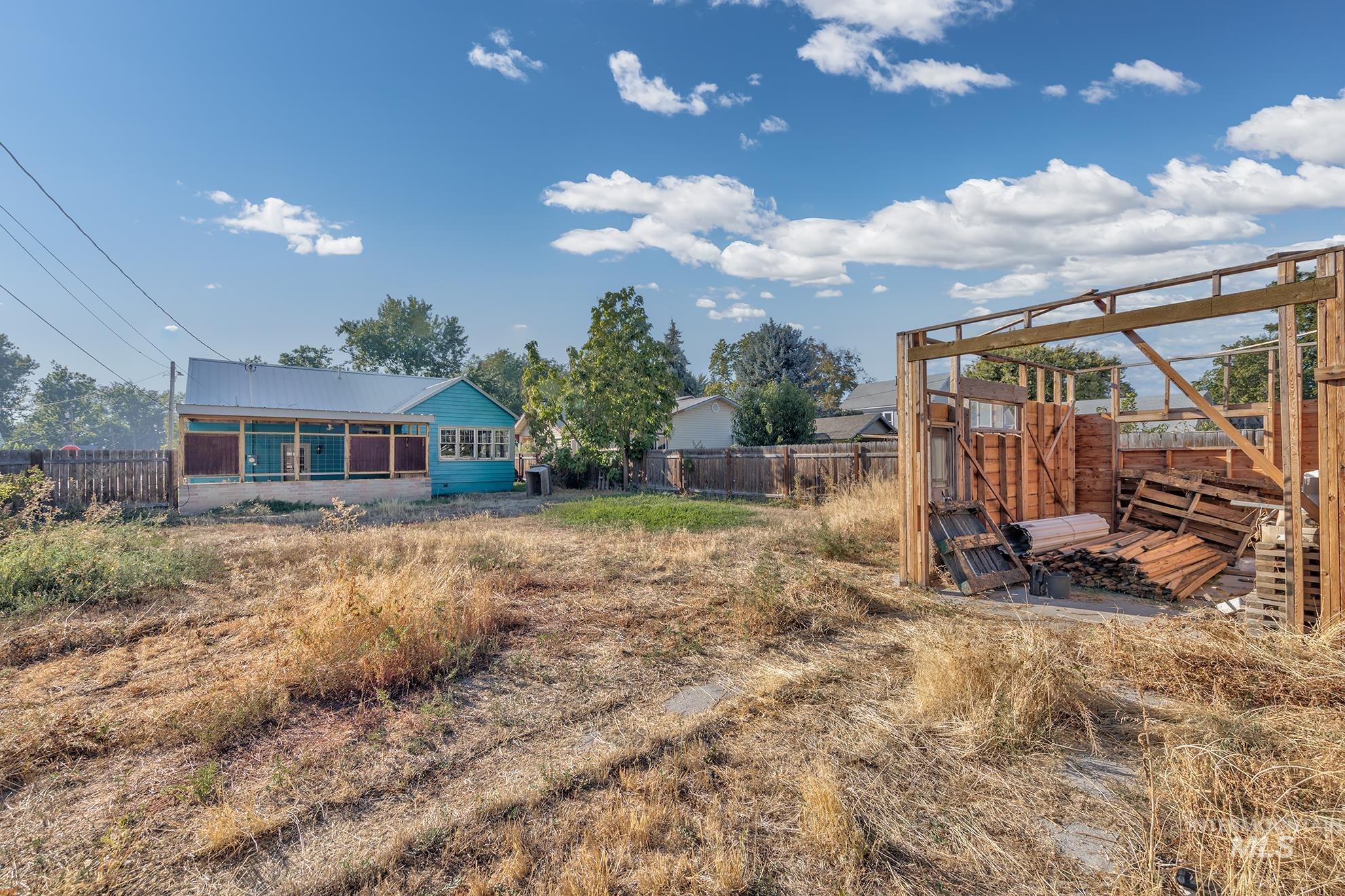 View of fenced backyard