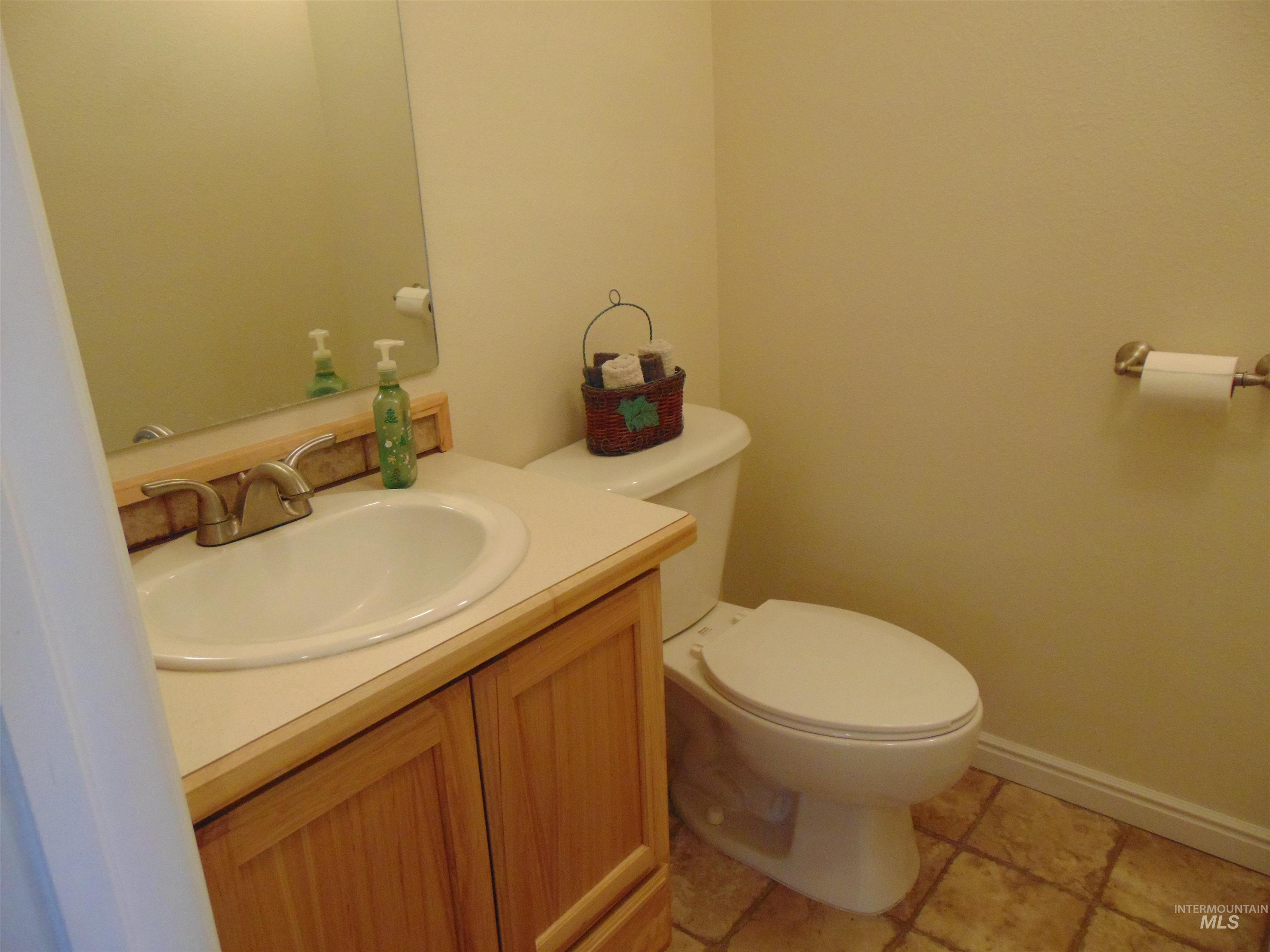 Bathroom featuring vanity and light tile patterned flooring