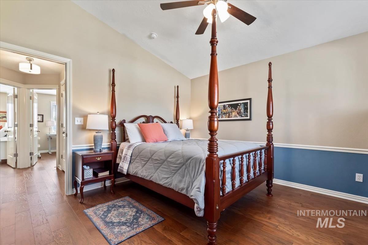 Primary Bedroom with lofted ceiling, walk-in closet and en suite Bathroom