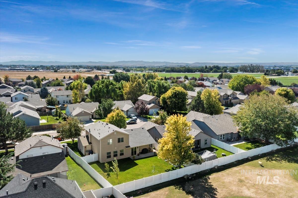 Aerial view of residential area with mountains