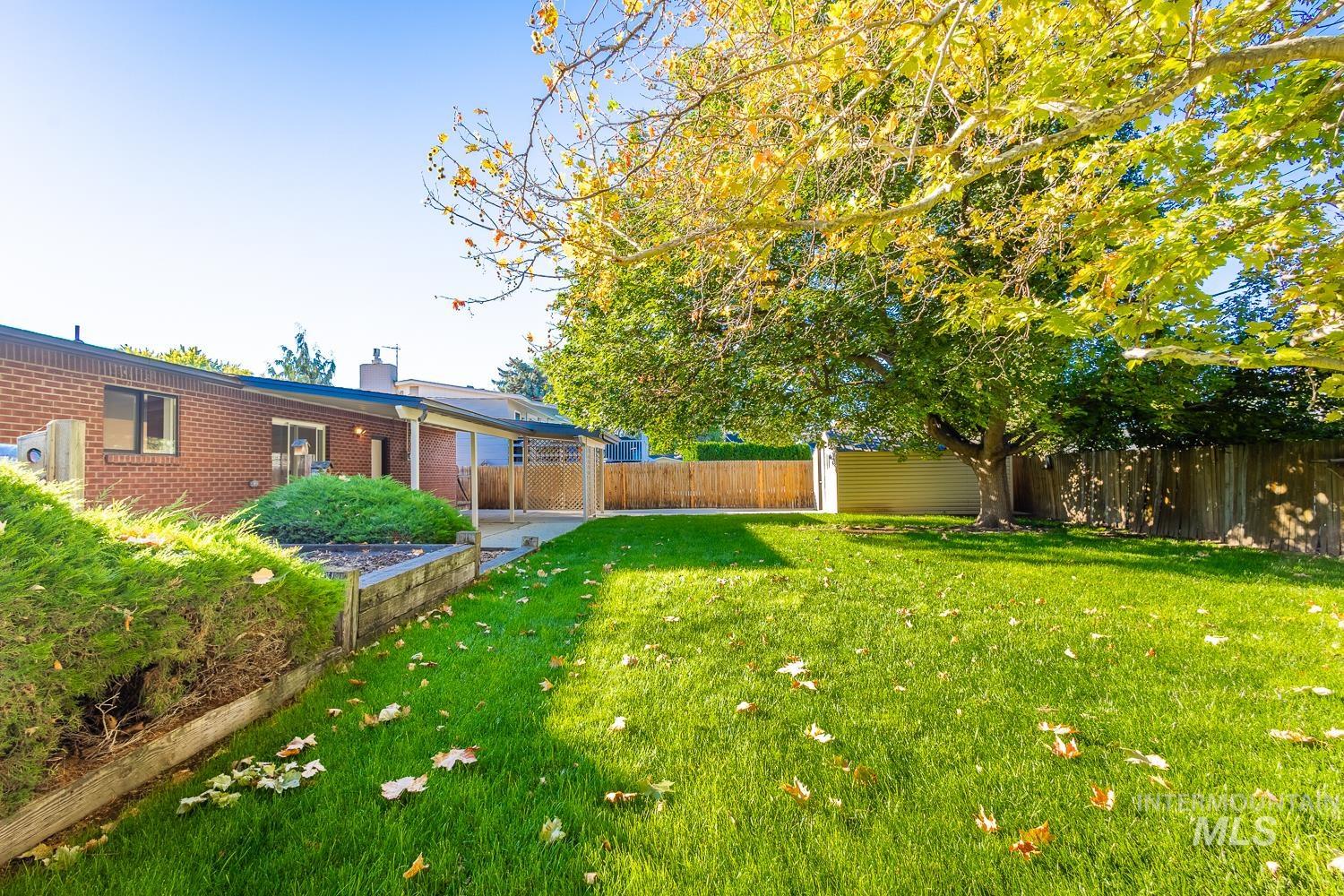 View of fenced backyard