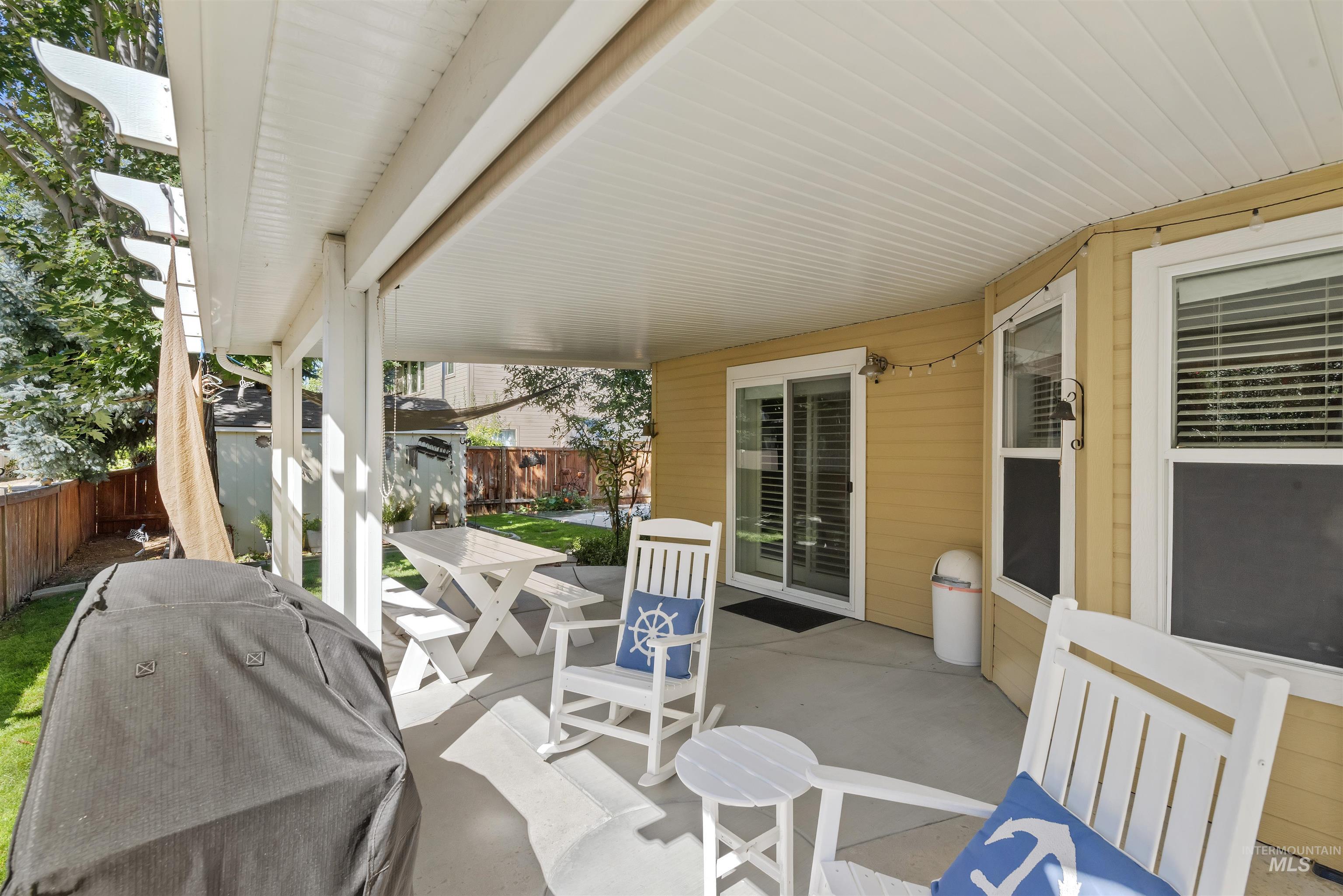 View of patio / terrace with grilling area and a storage unit