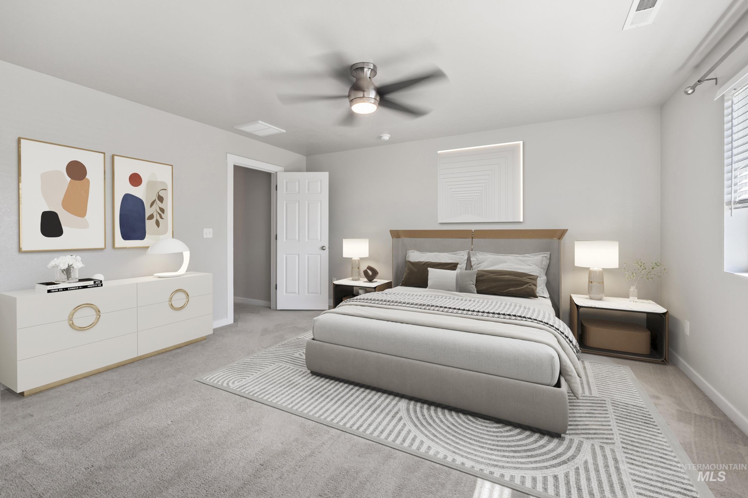 Bedroom featuring carpet and ceiling fan