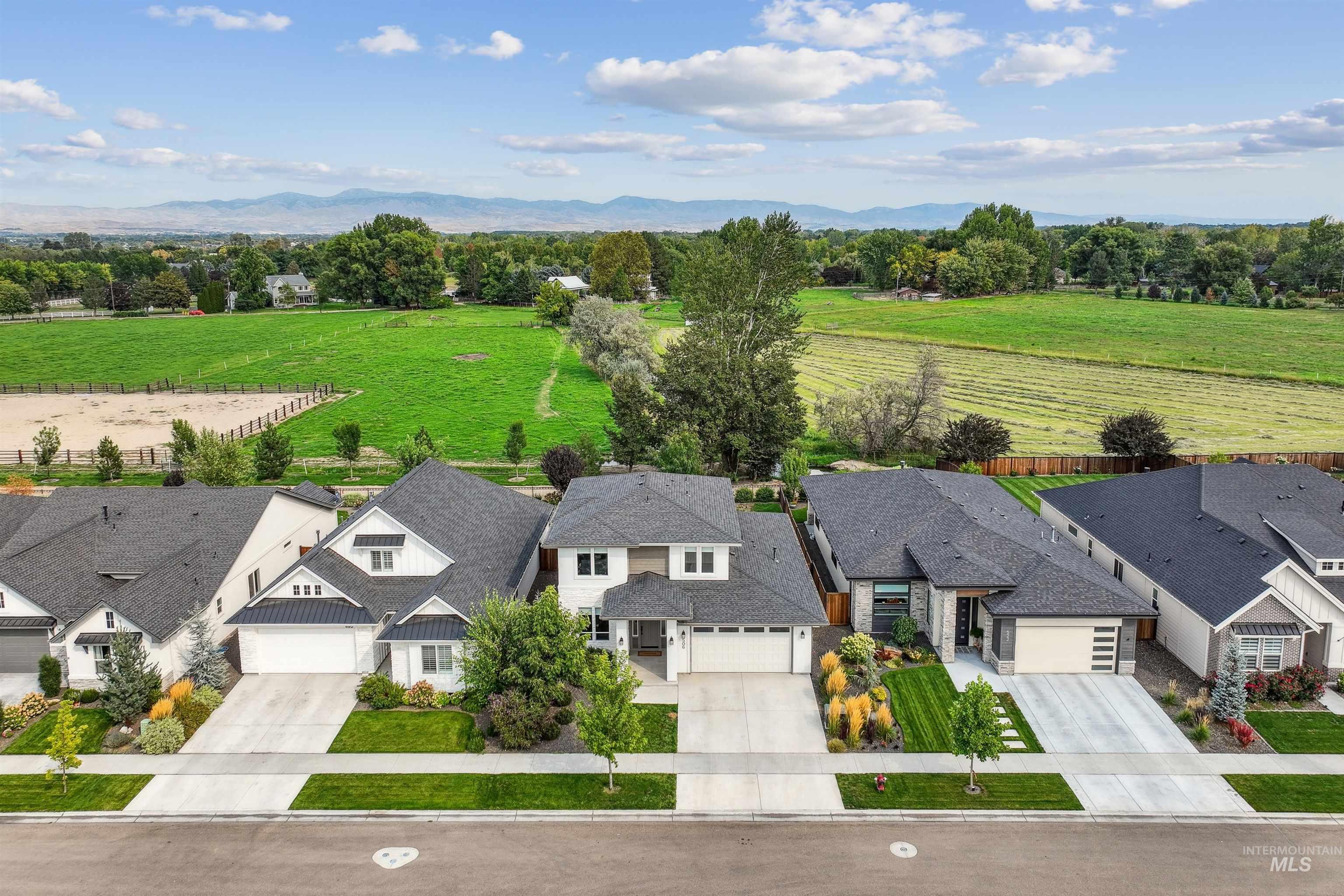 Aerial view of residential area with a mountainous background