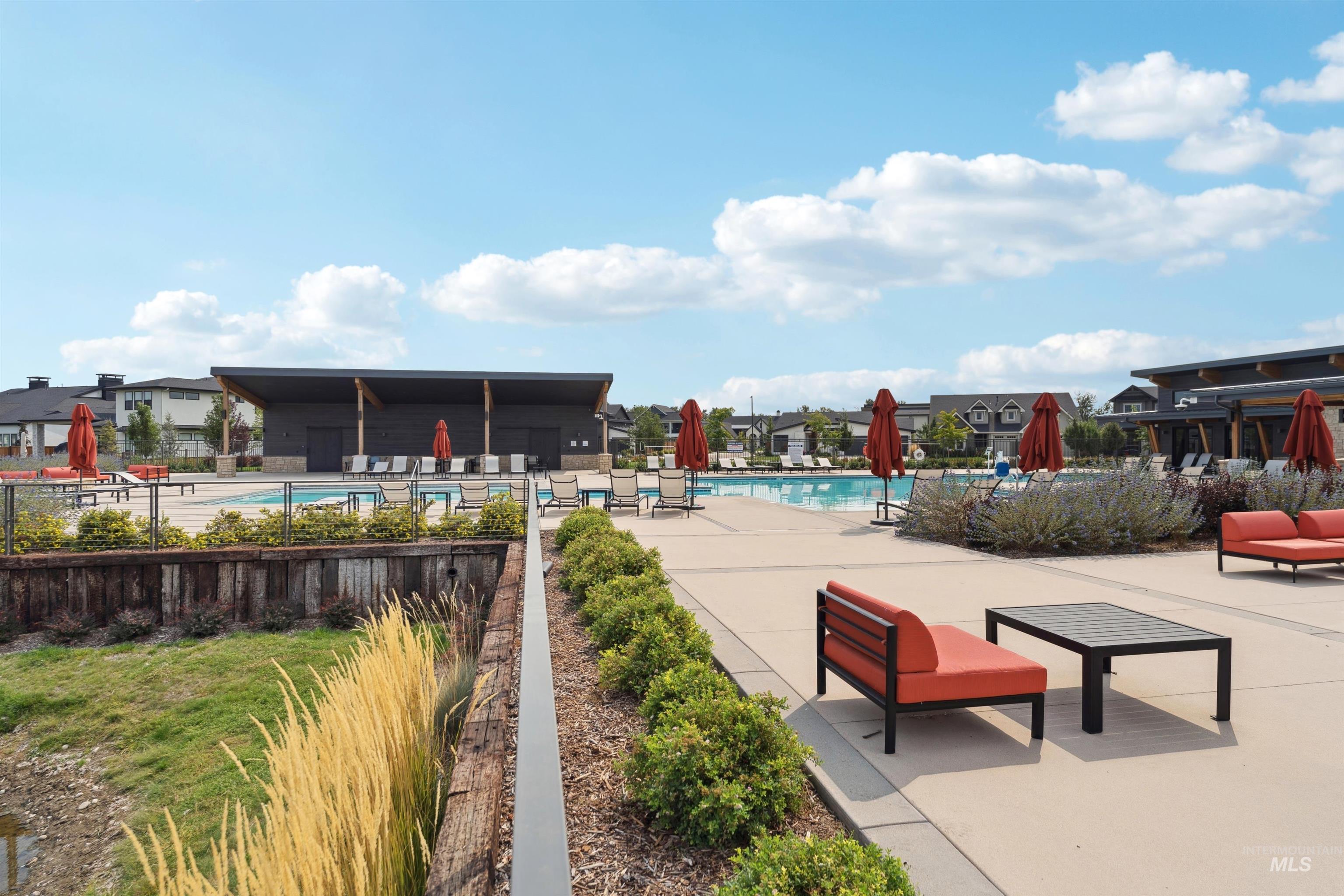Community pool with a patio area