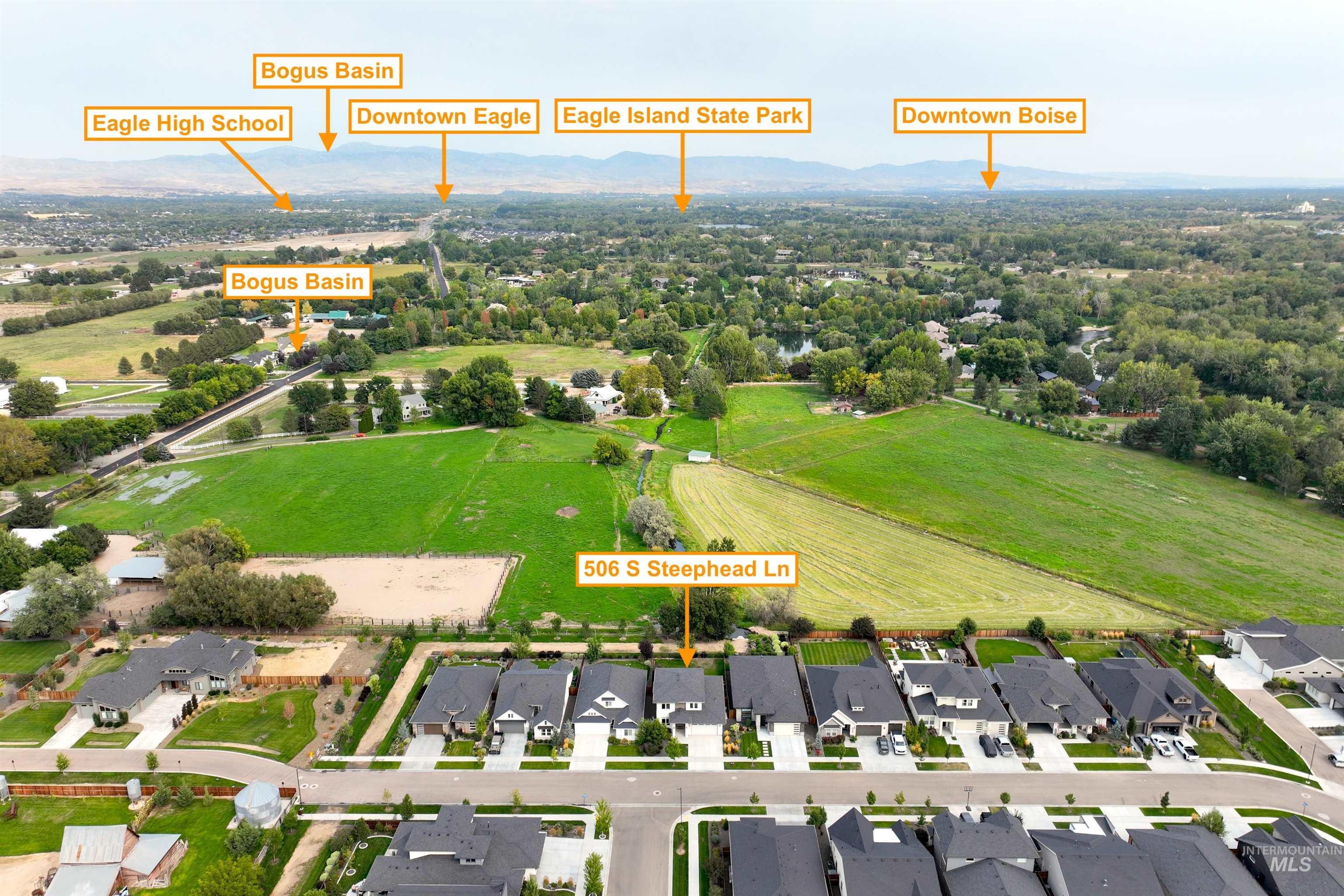 Aerial view of residential area with a mountain backdrop