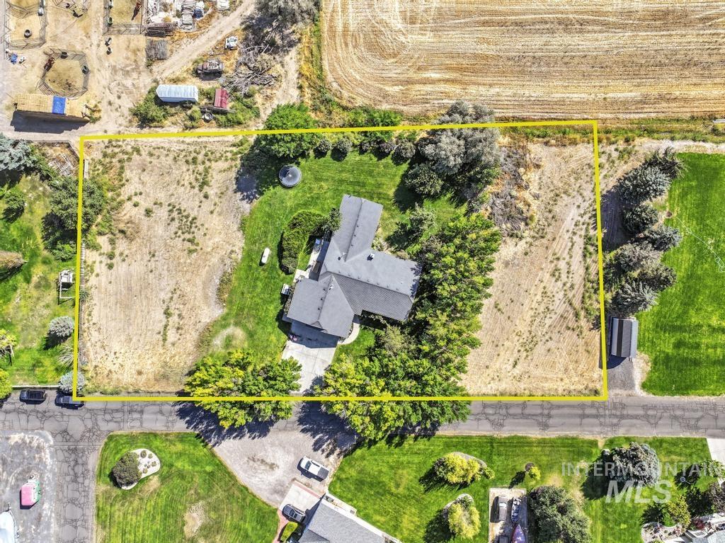 Overview of rural landscape with property parcel outlined