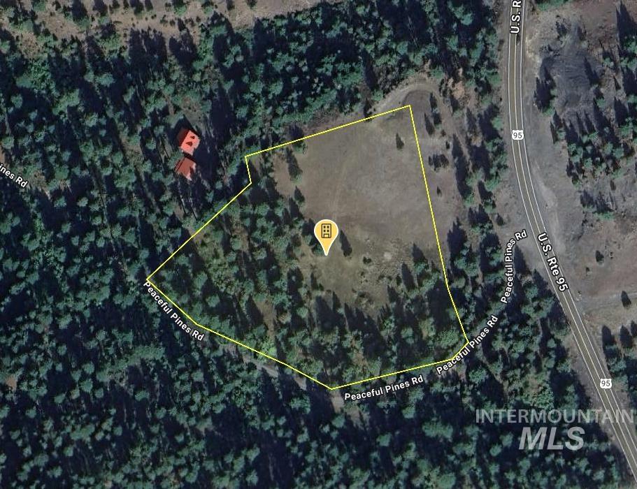 Aerial overview of property's location featuring property boundaries highlighted