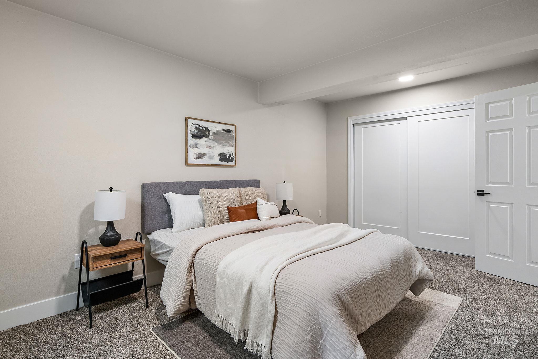 Bedroom featuring carpet floors
