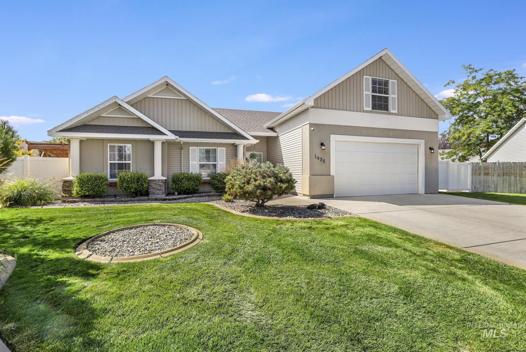 Craftsman inspired home with concrete driveway, a shingled roof, and stucco siding
