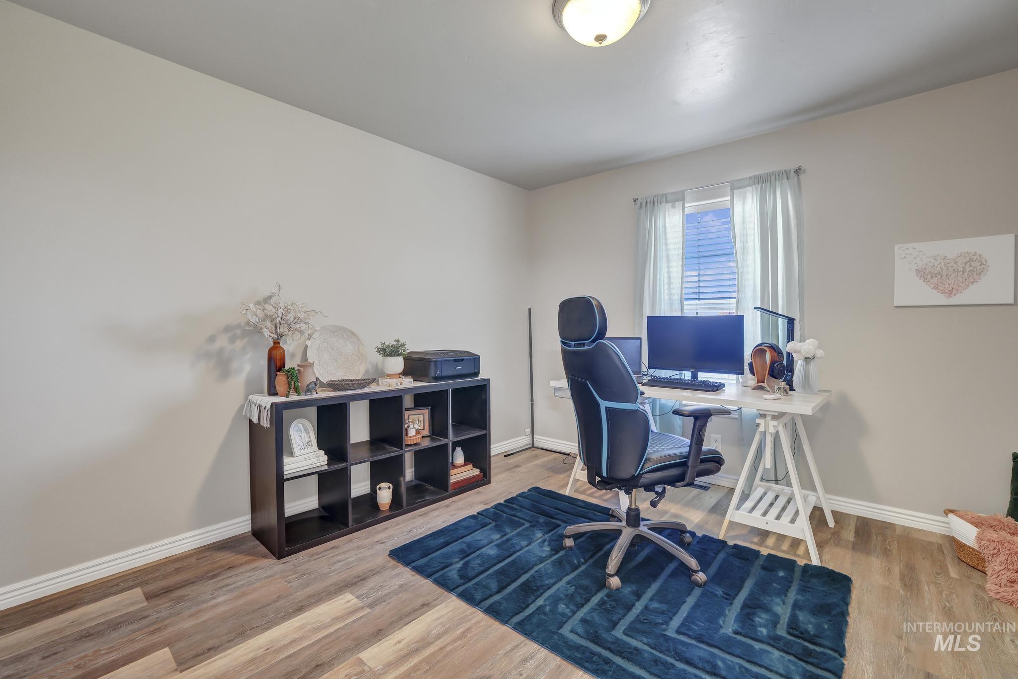 Office space featuring light wood finished floors