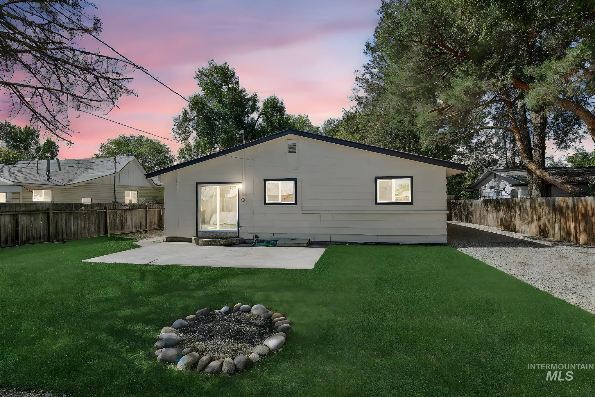 Back of house featuring a patio and a fenced backyard