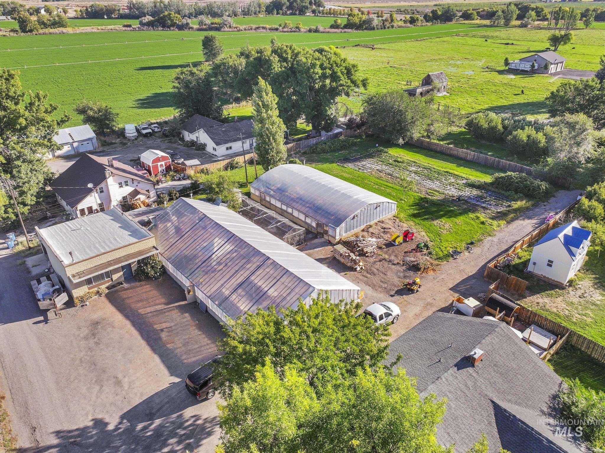 Aerial view of sparsely populated area with extensive farmland