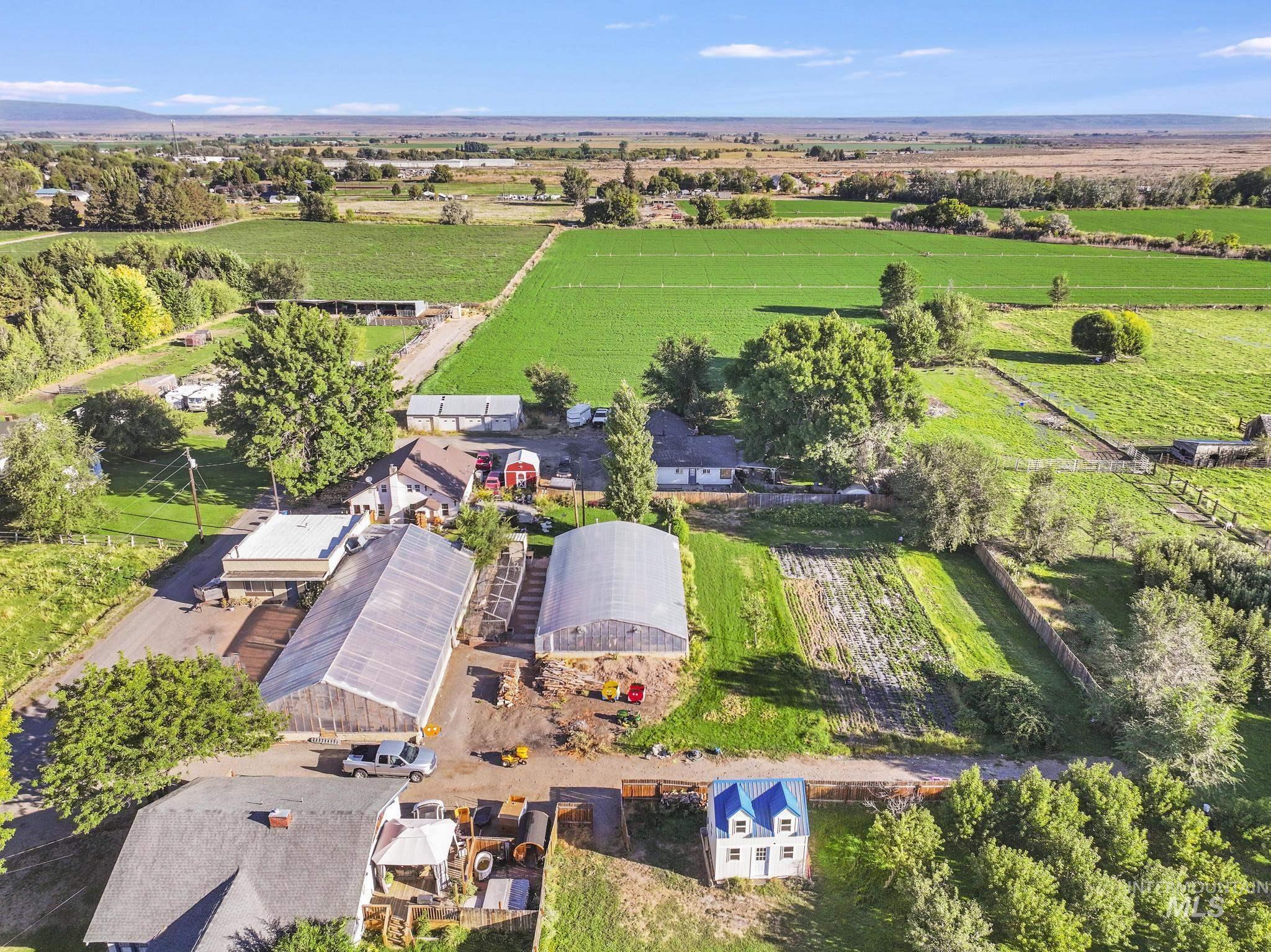 View of property location with rural landscape and extensive farmland