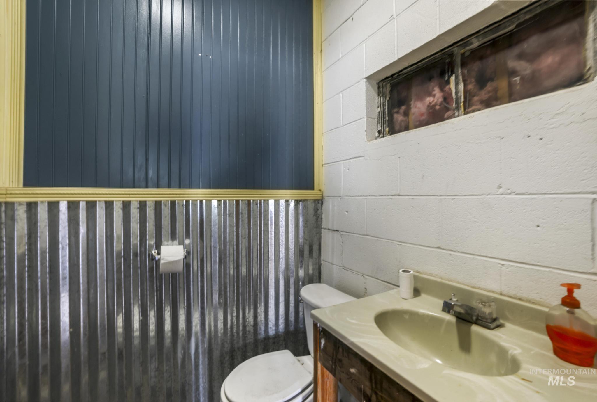 Half bath with toilet and vanity