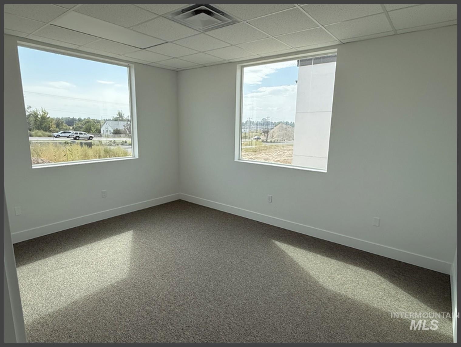 Spare room with a drop ceiling