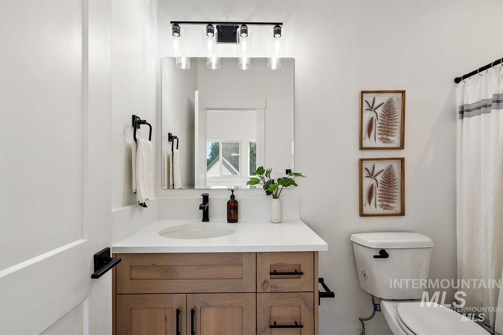 Bathroom with toilet and vanity