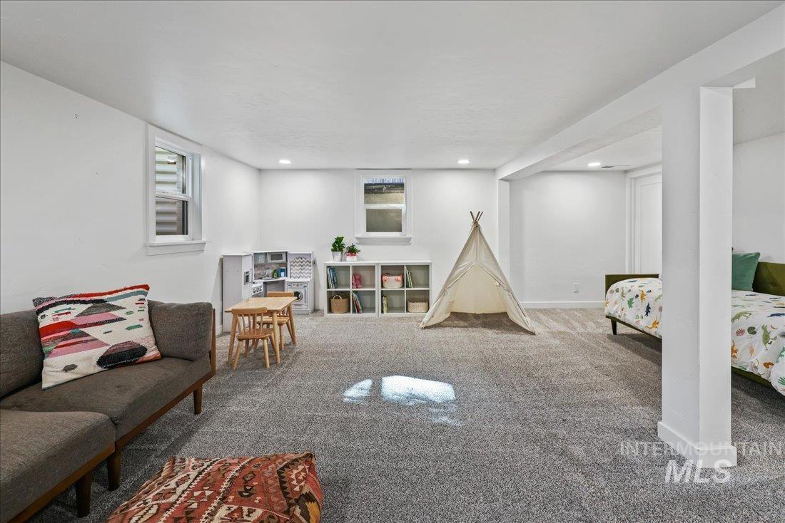 Game room featuring carpet floors and recessed lighting