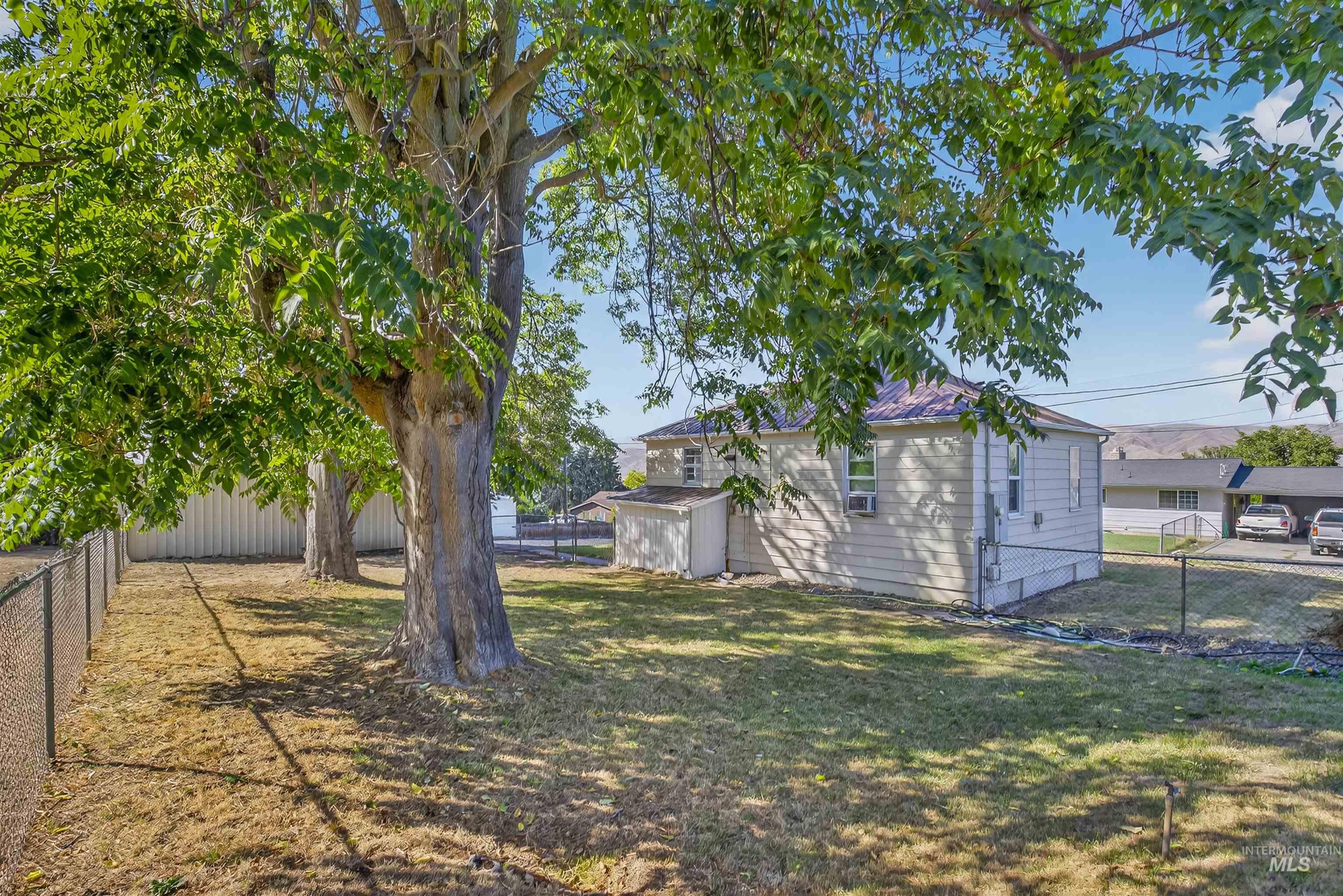 View of fenced backyard