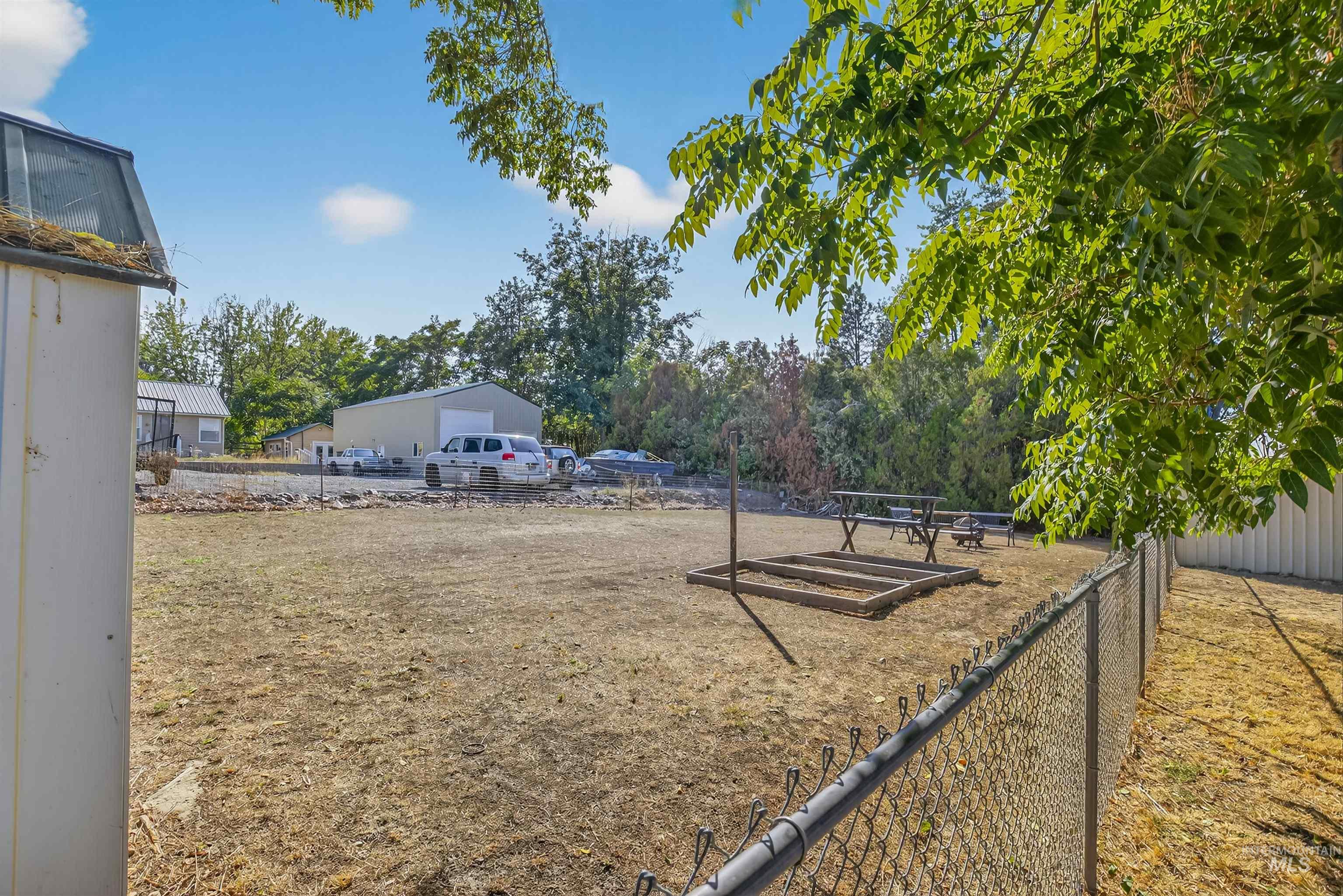 View of yard featuring view of scattered trees