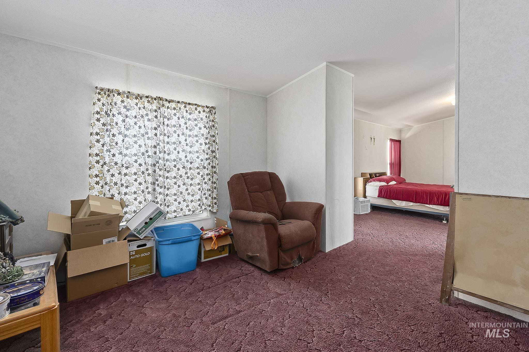 Sitting room with carpet floors