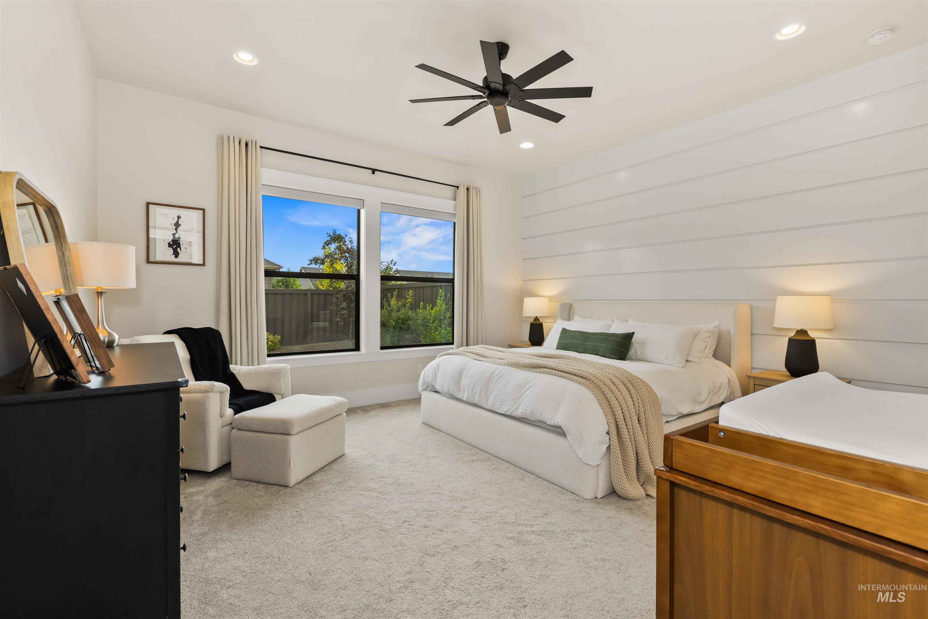 Bedroom featuring carpet flooring, recessed lighting, and ceiling fan