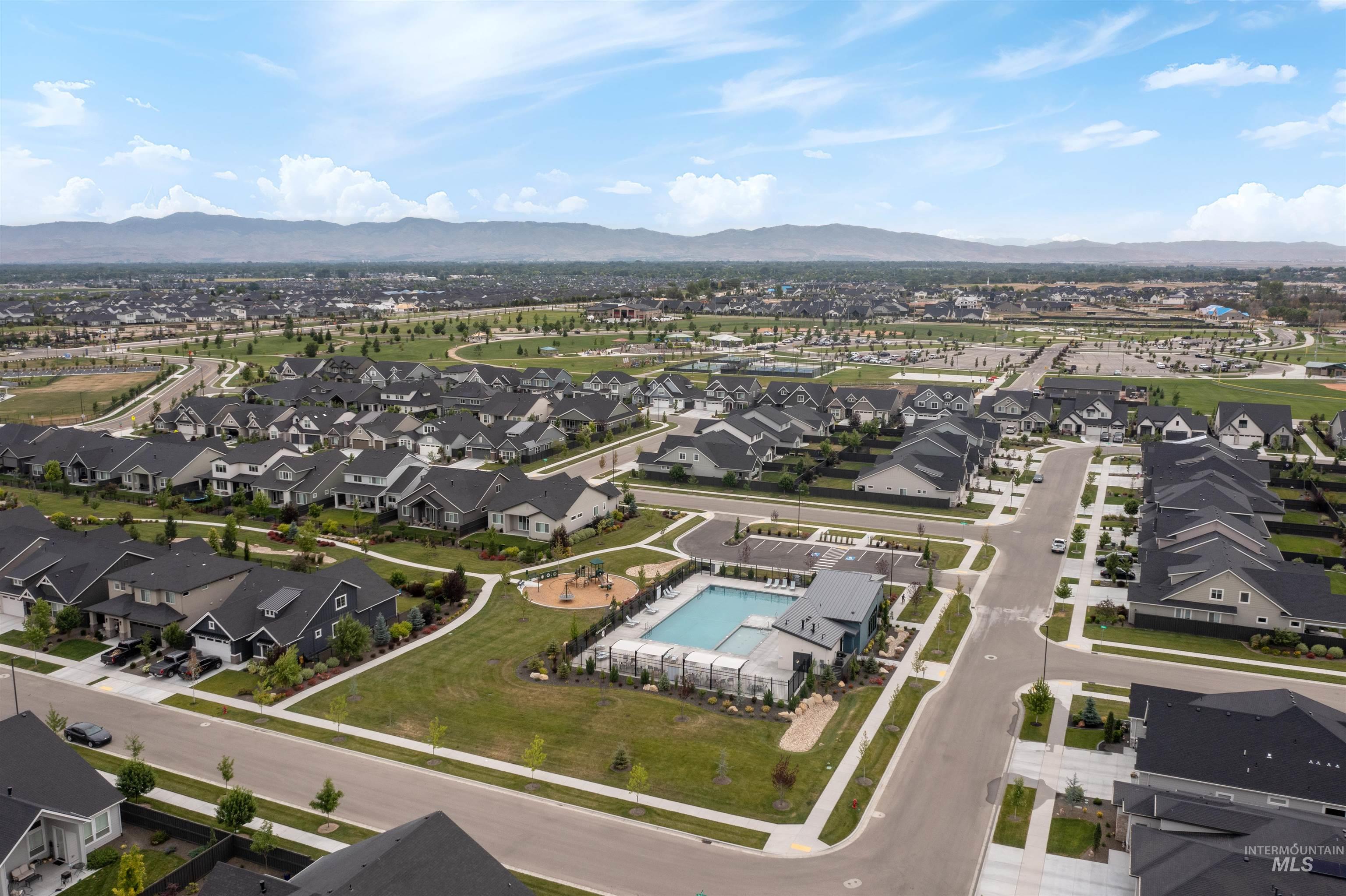 Aerial perspective of suburban area with mountains