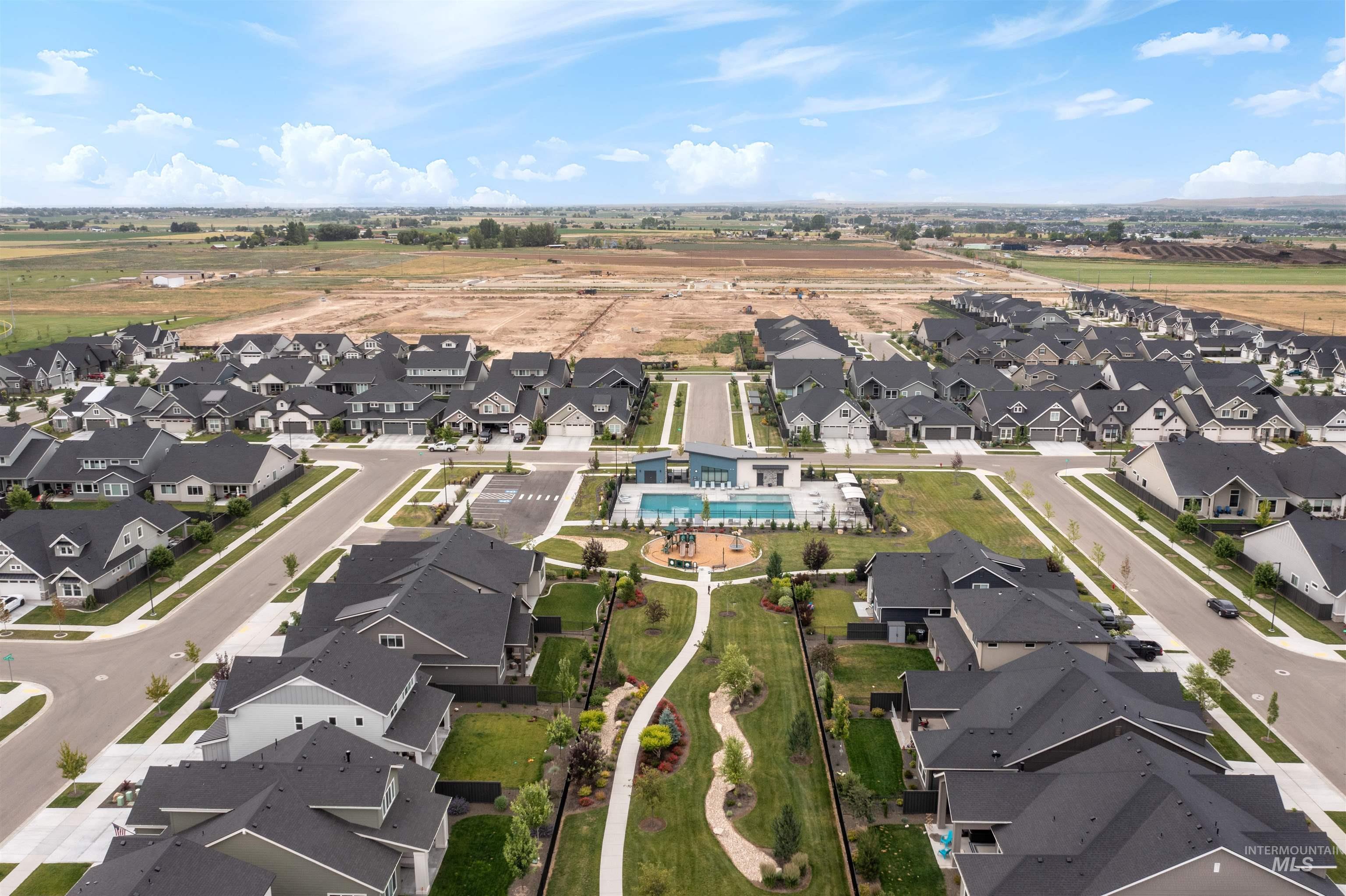 Aerial view of residential area with a pool