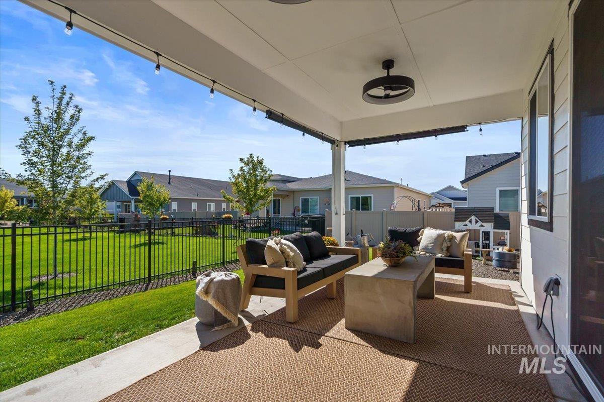 View of patio / terrace with an outdoor living space and a residential view
