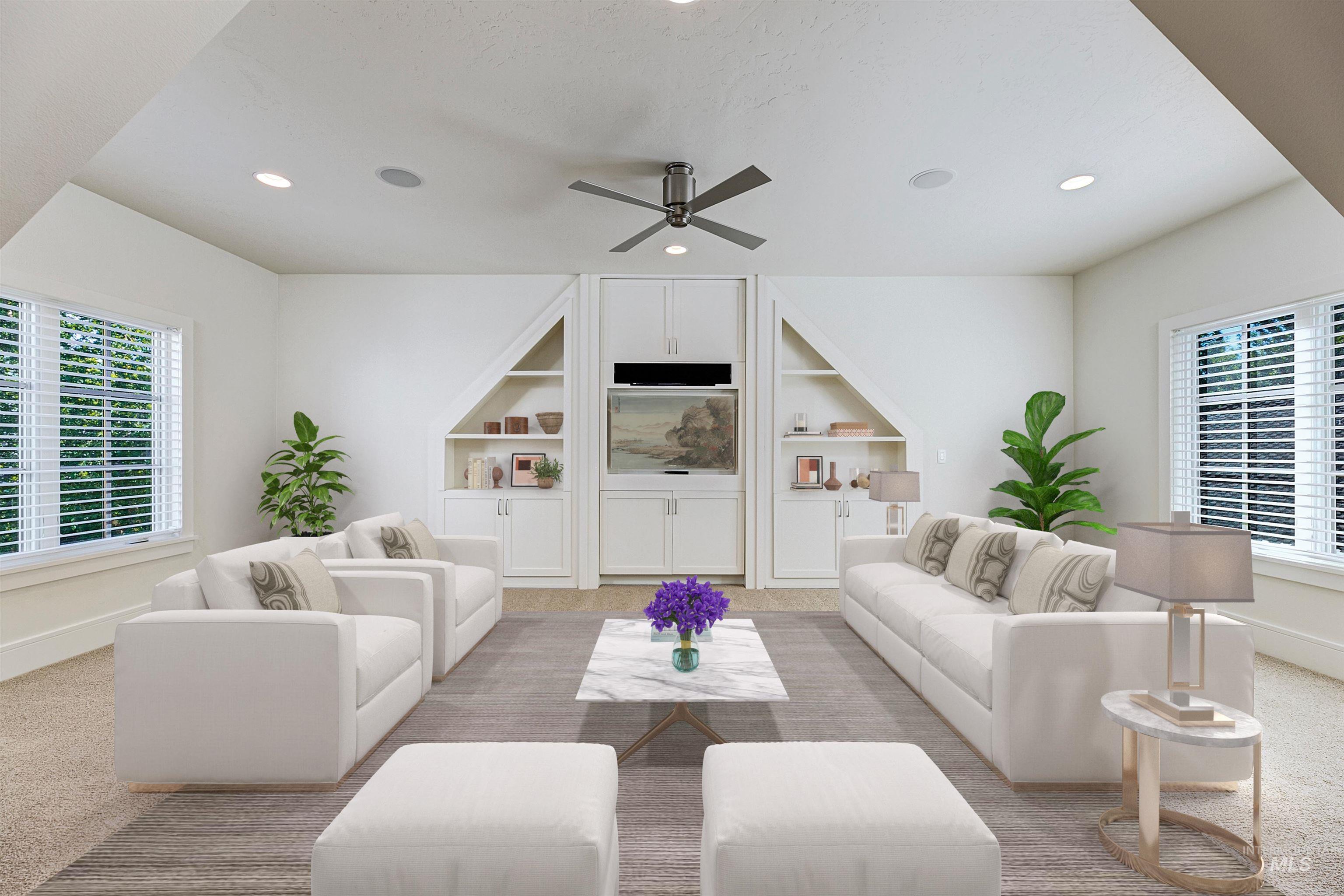 Living area with plenty of natural light, light carpet, recessed lighting, built in shelves, and a ceiling fan