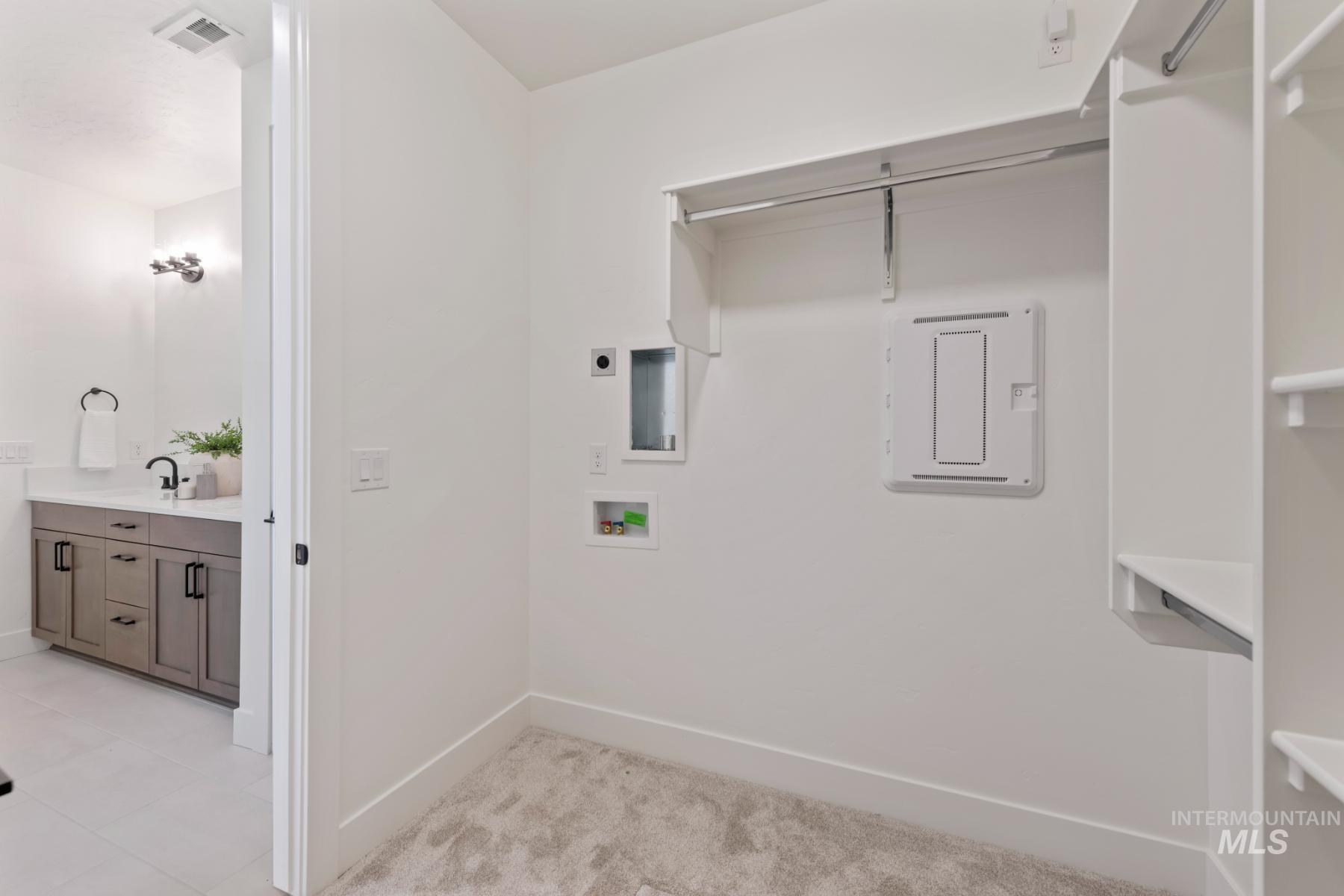 Laundry area featuring washer hookup and hookup for an electric dryer