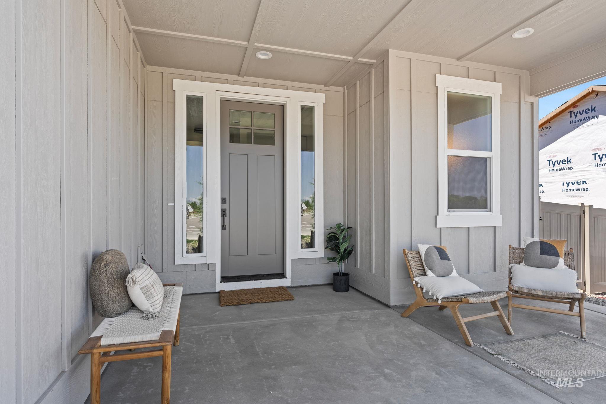 Entrance to property featuring a patio