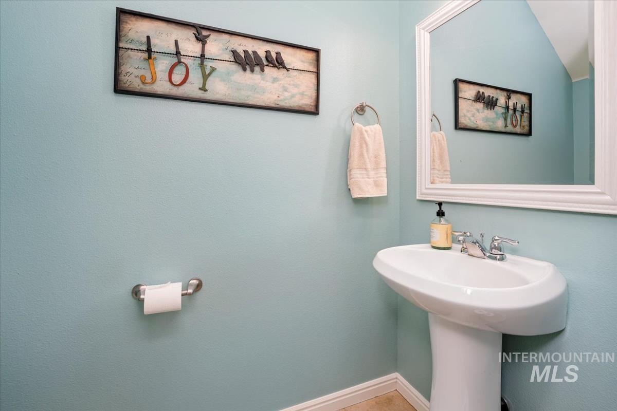 Bathroom featuring baseboards