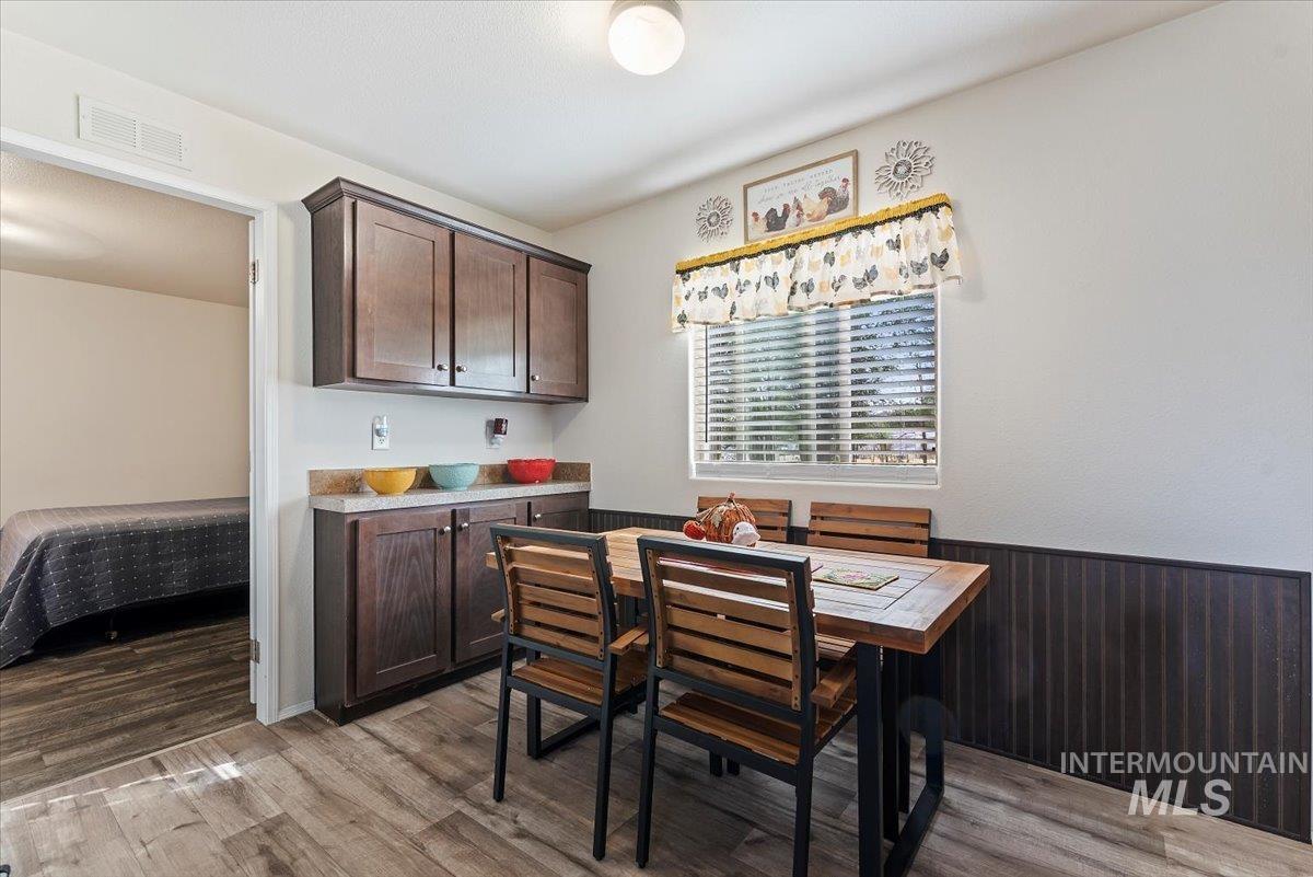 Dining area featuring light wood finished floors