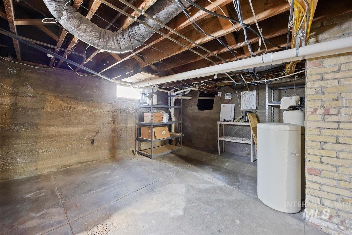 Below grade area with a water softener system