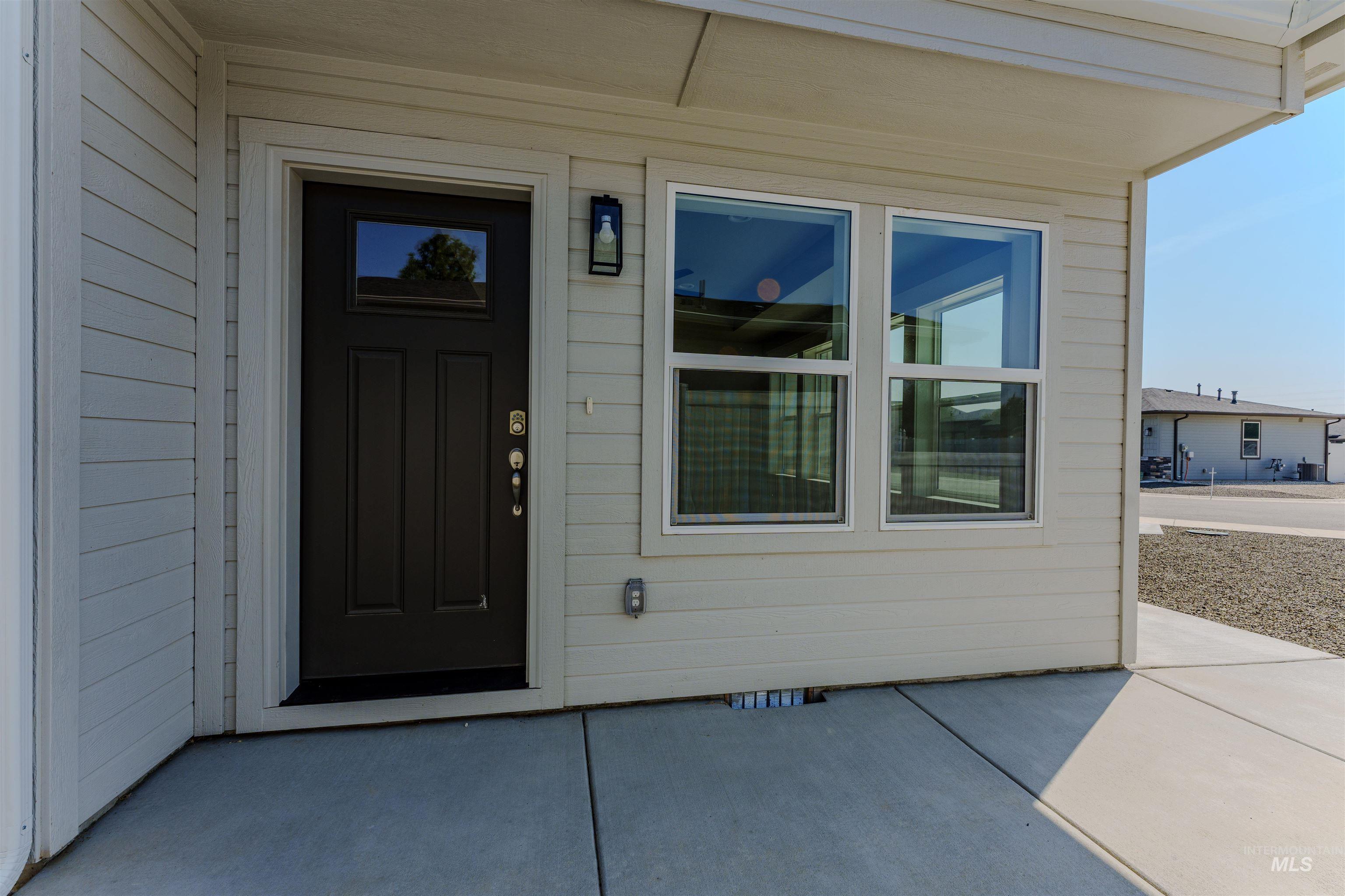 Entrance to property with a patio area