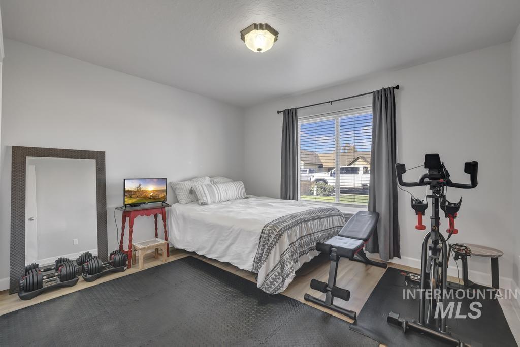 Bedroom with wood finished floors