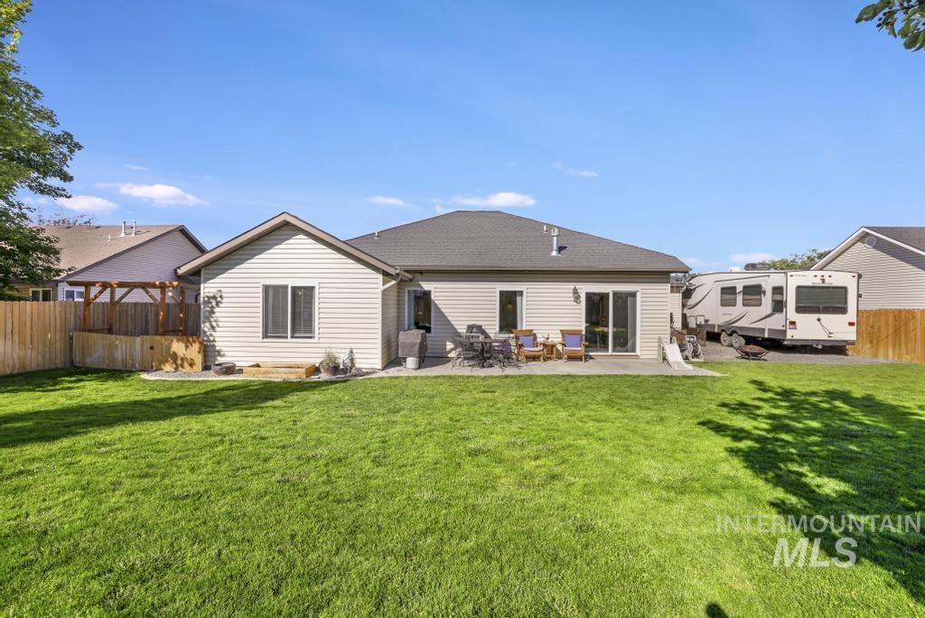 Back of property with a patio area
