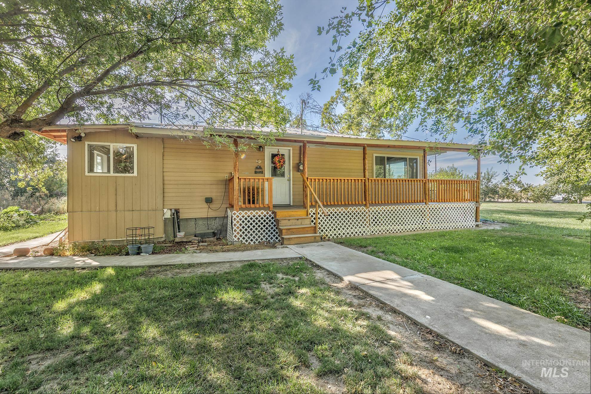View of front of house with a front yard
