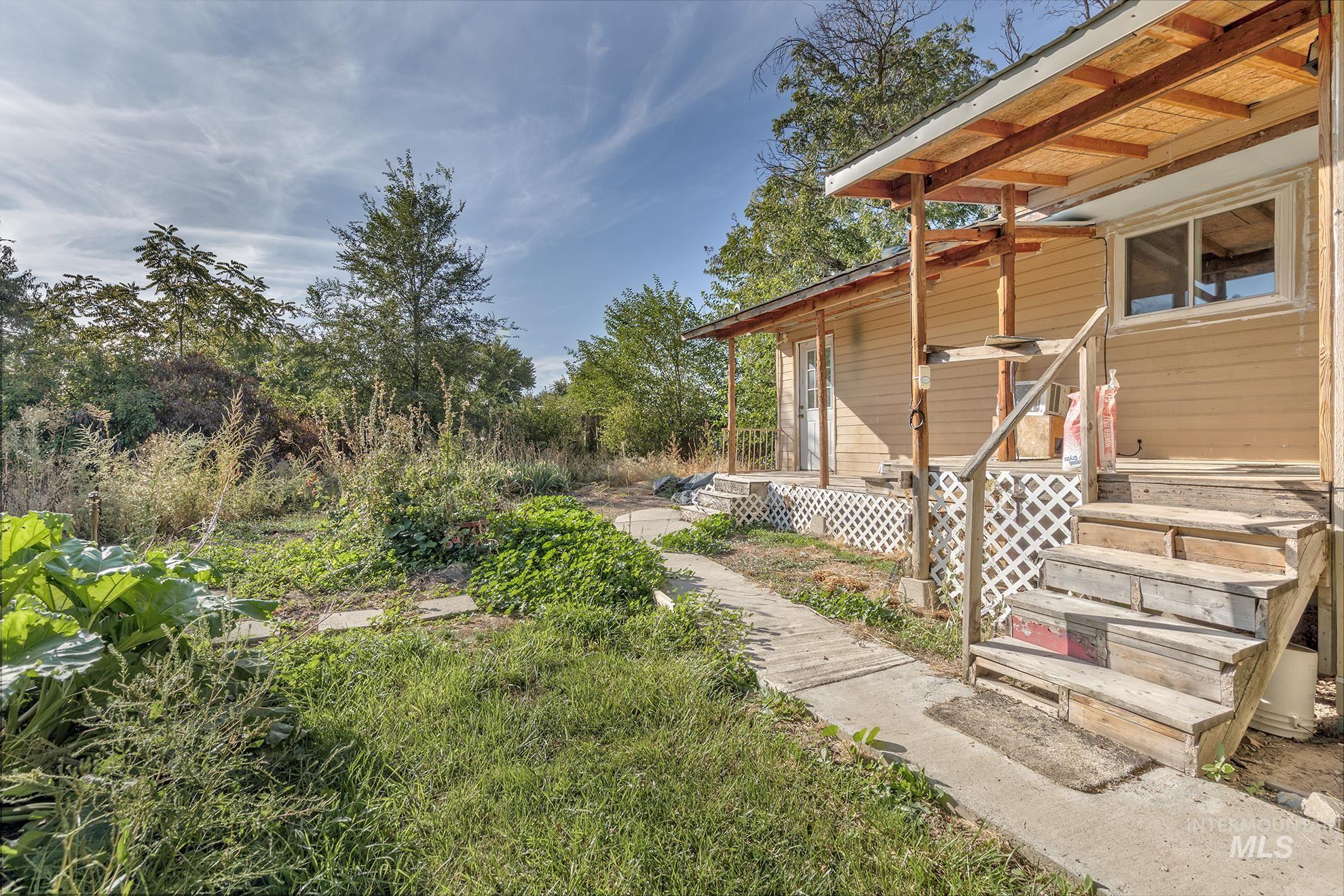 View of yard featuring view of wooded area