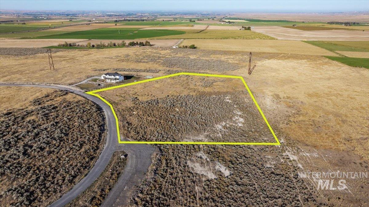 Overview of rural landscape featuring property parcel outlined