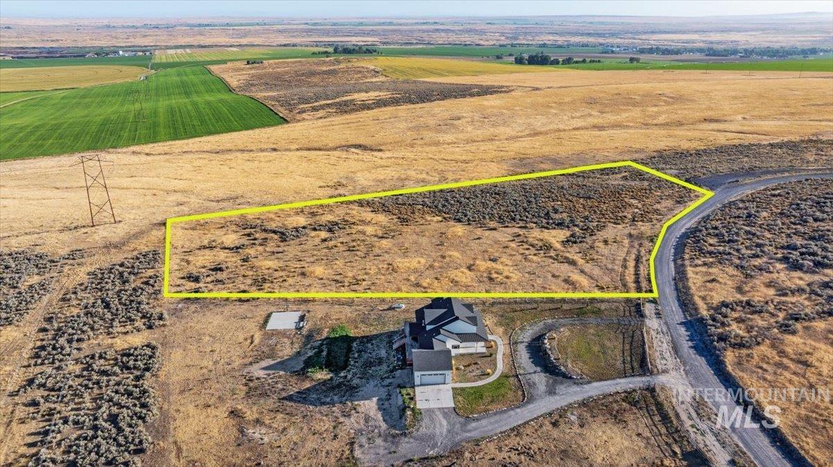 Overview of rural landscape featuring property parcel outlined