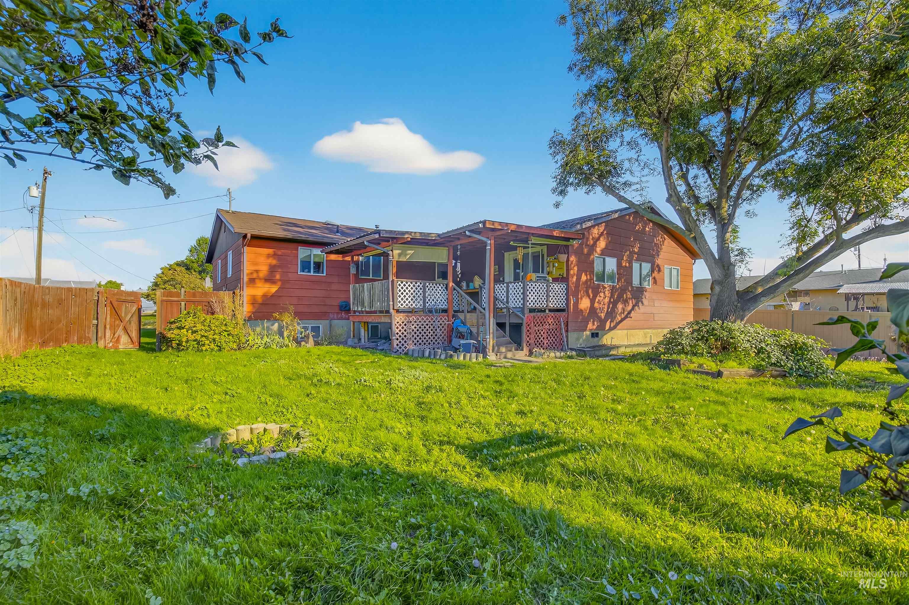 Rear view of house with a deck