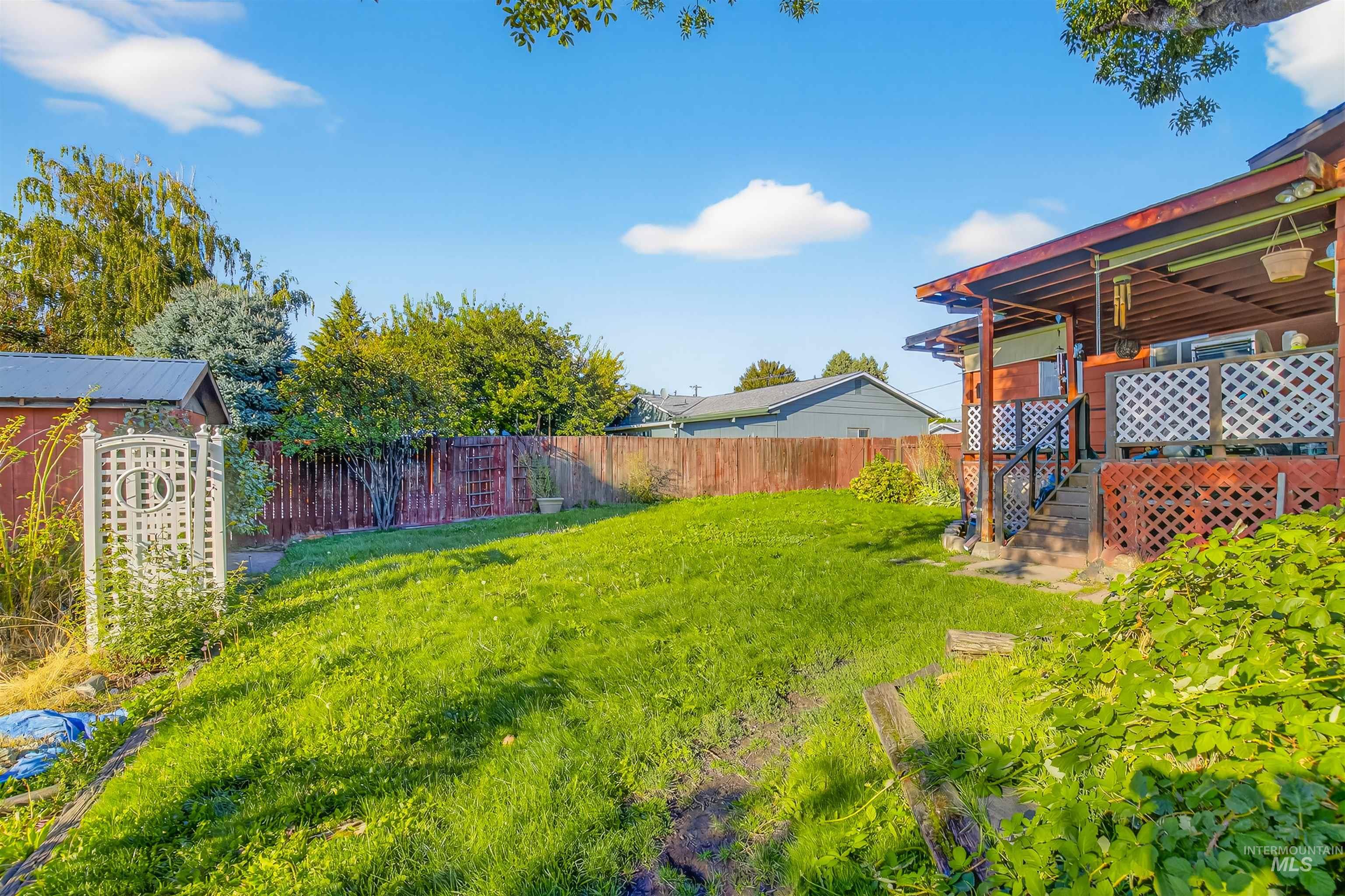 View of yard featuring a deck