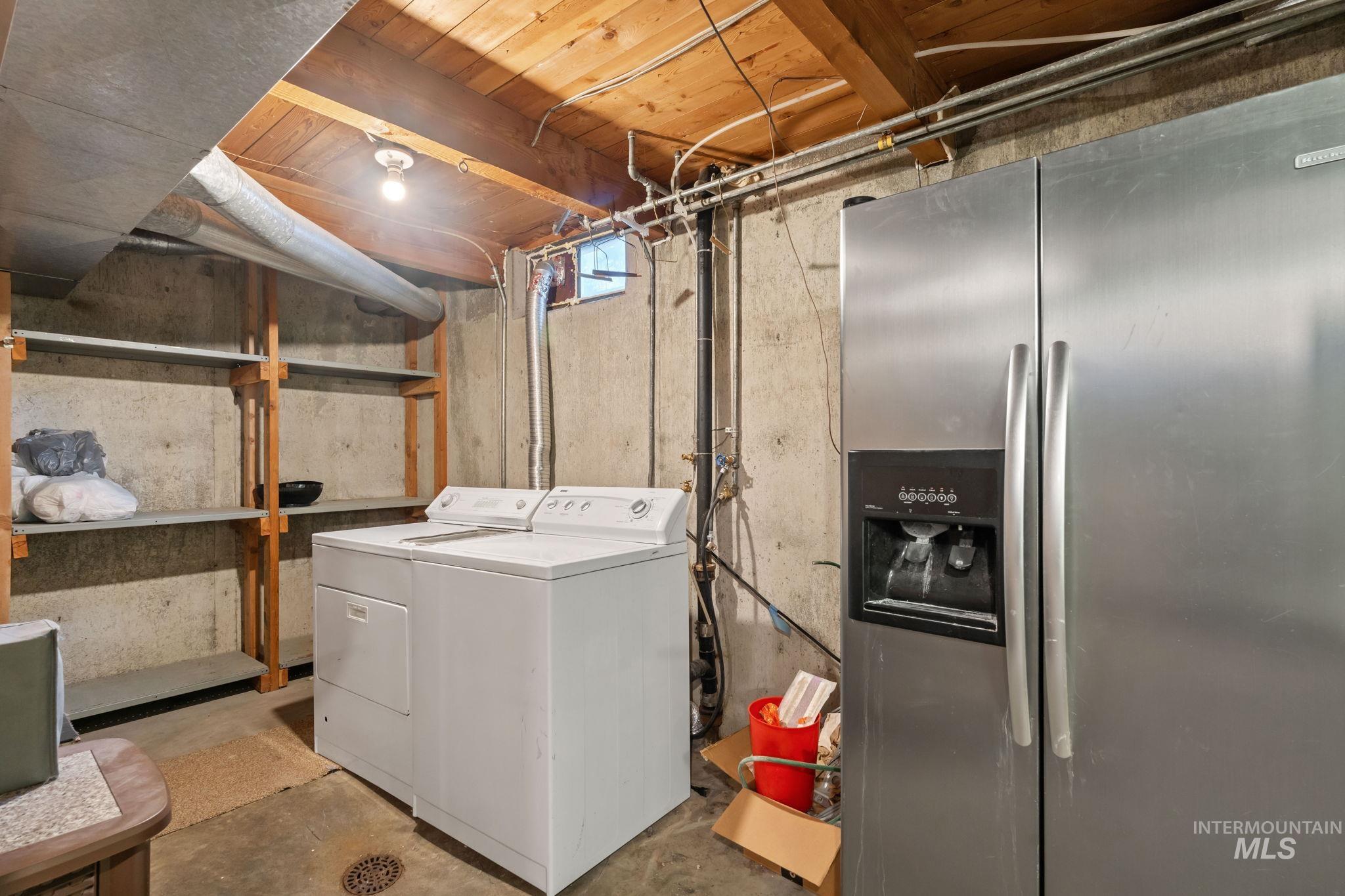 Washroom featuring separate washer and dryer