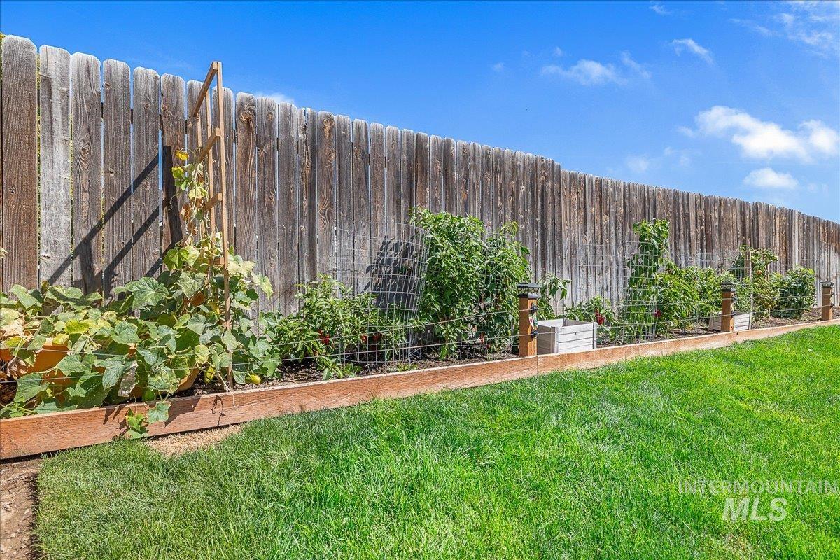 Garden area runs the full length of the back fence.