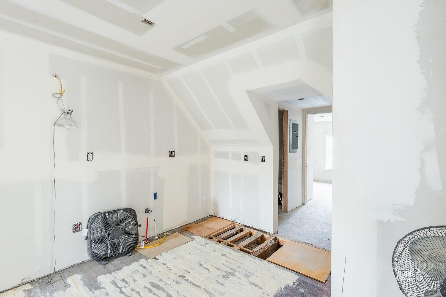 Bonus room featuring vaulted ceiling and electric panel