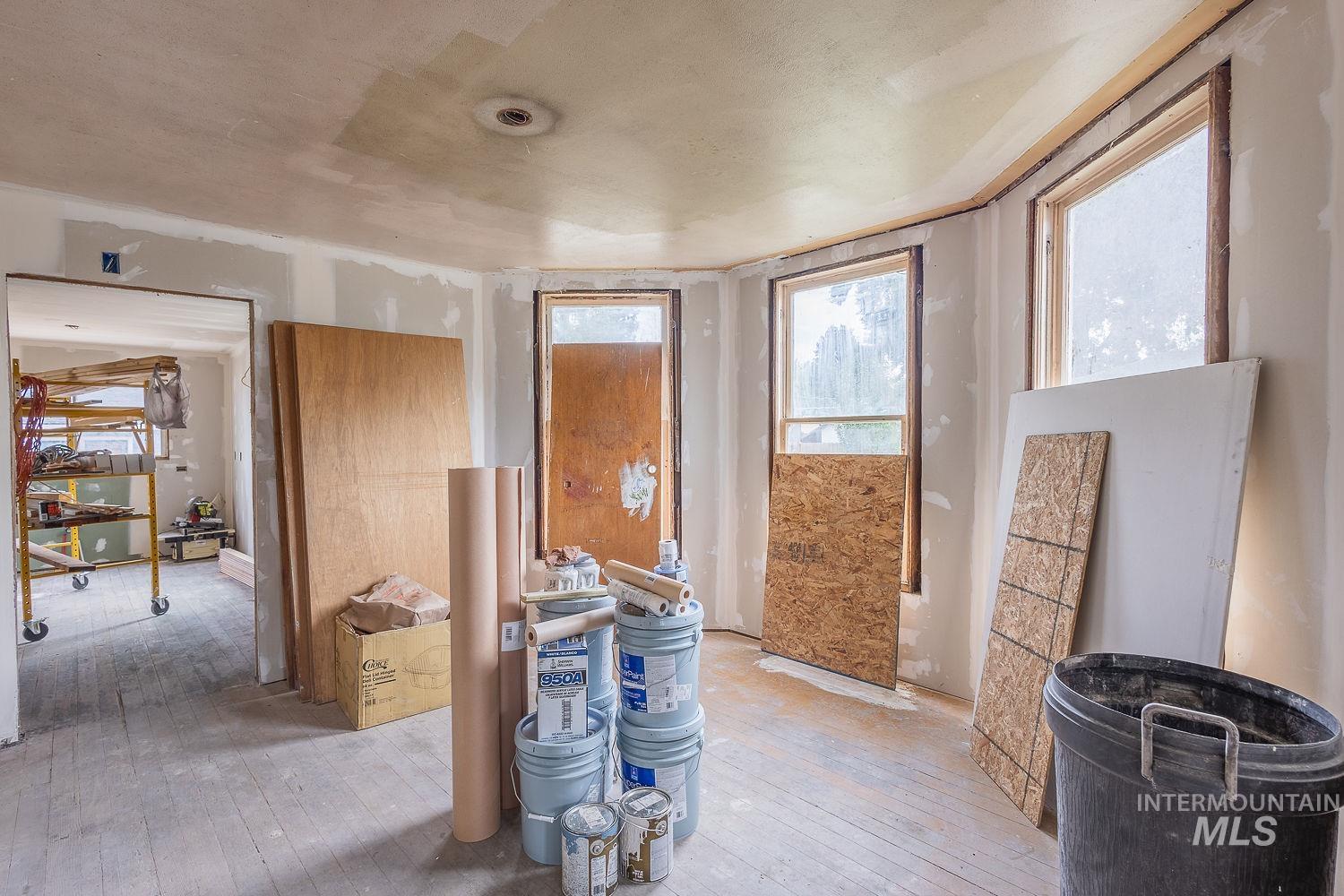 Miscellaneous room with hardwood / wood-style flooring