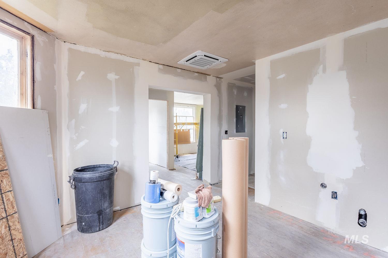 Basement featuring electric panel